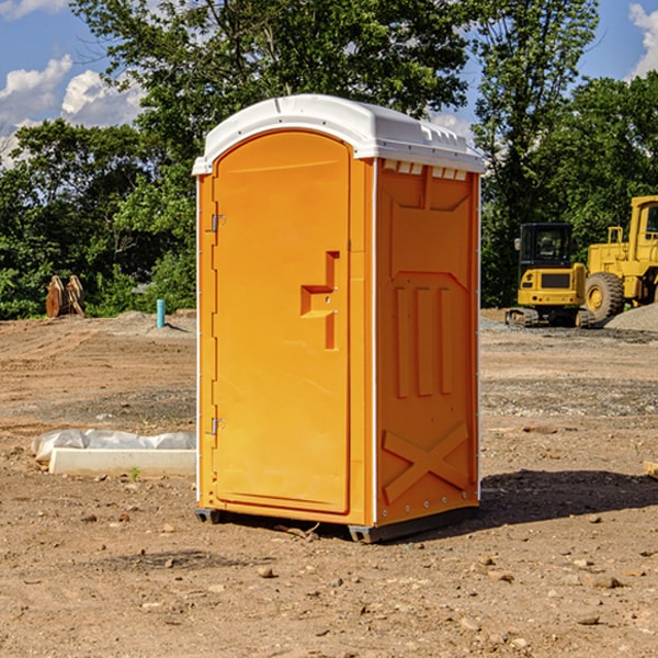 what is the cost difference between standard and deluxe portable restroom rentals in Moulton